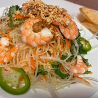6. Green Papaya Salad · Goi du du. shredded green papaya, tossed with basil and house made sauce topped with dried o...