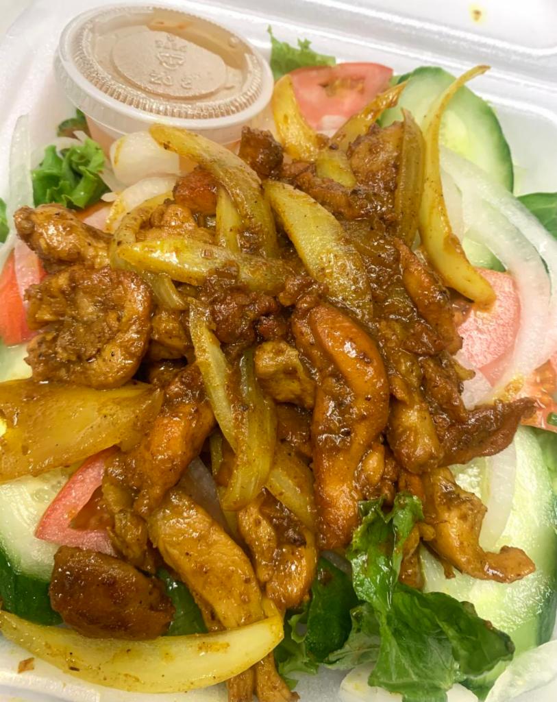 7. Lemongrass Chicken Salad · Stir fried Lemongrass chicken served on a bed of romaine lettuce, cucumber, tomato, onion, and house made sauce.