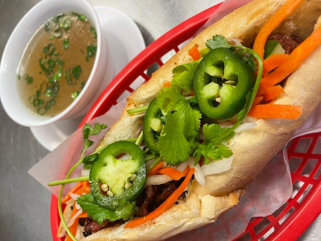 10. Banh Mi · French bread sandwich. Served with cucumber, cilantro, pickled carrots and radish, and jalapeno. Add any add-ons for an additional charge. 