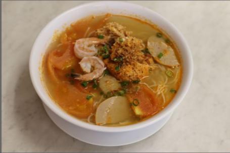 13. Crab Noodle Soup · Bun rieu. Tomato based broth, steamed pork, crab, shrimp, pig blood, tofu, tomato, and vermicelli noodles.