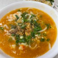 17. Crab & Shrimp Udon  · Bánh Canh Cua. Served in thick umami-rich broth topped with shrimp, crab meat, bean sprouts,...
