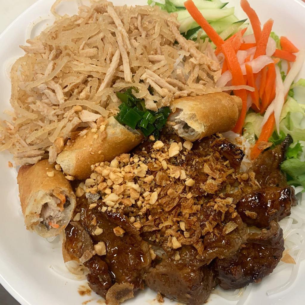 45. Spring Roll, BBQ Pork, and Shredded Pork Vermicelli · Served with cucumber, lettuce, basil, bean sprouts, pickled veggies, mint, fried onion flakes, peanuts, and house made fish sauce