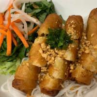 48. Vegetarian Spring Roll Vermicelli · Vegetarian spring rolls made with only vegetables, tofu, and beans served with lettuce, cucu...