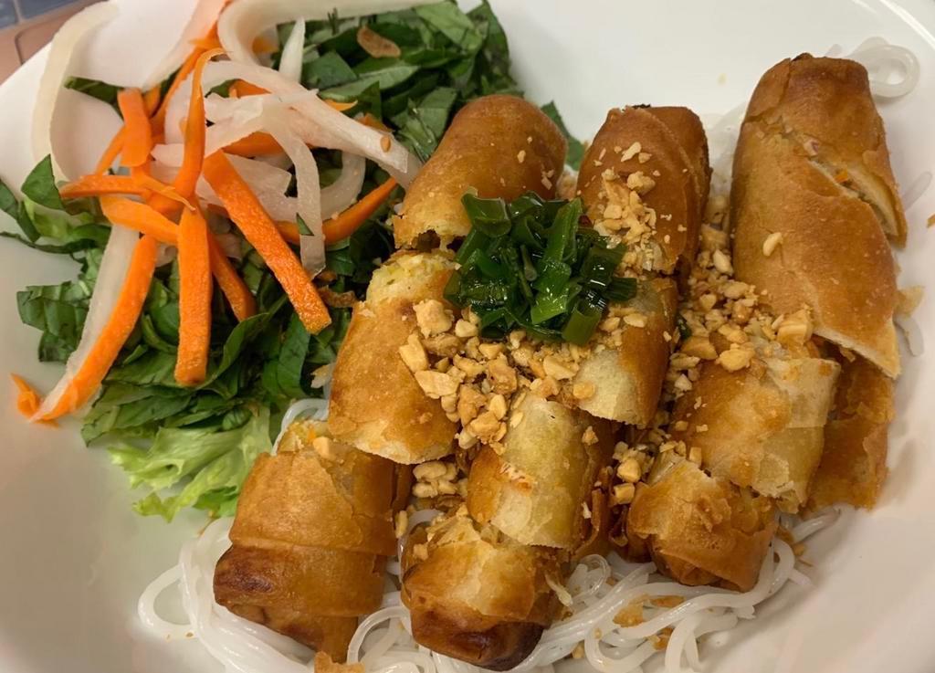 48. Vegetarian Spring Roll Vermicelli · Vegetarian spring rolls made with only vegetables, tofu, and beans served with lettuce, cucumber, basil, mint, pickled veggies, fried onion, and peanuts.