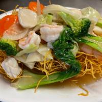 65. Crispy Fried Noodles · Stir fried cabbage, carrots, broccoli, ong choi, served over Crispy Egg noodles  