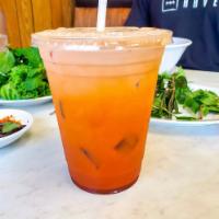 Thai Iced Tea · Fresh brewed Thai tea served over ice 