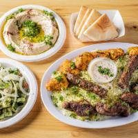 Dinner for Four · Large Hummus ＆ Large Baba Ghanoush; choice of 3 meats (chicken kabob, kofta kabob, chicken s...