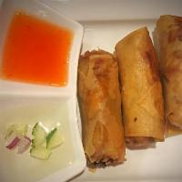 2. Egg Roll · 3 pieces. Vegetable, clear noodle and chicken served with sweet and sour peanut sauce.