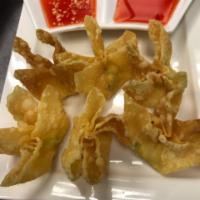 Crab Rangoon · real crab meat and imitation crab meat in wonton wrap and fried to crispy