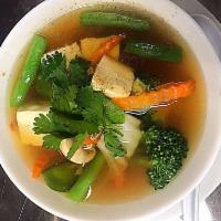 10. Vegetable Soup · Clear broth with soft tofu and vegetables.