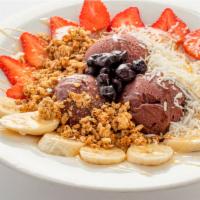 Acai Bowl · Acai berry sorbet topped with fresh strawberries, blueberries, bananas, granola, shredded co...