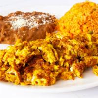 Huevos Con Chorizo · 2 eggs scrambled with spicy chorizo. Add avocado for an additional charge.