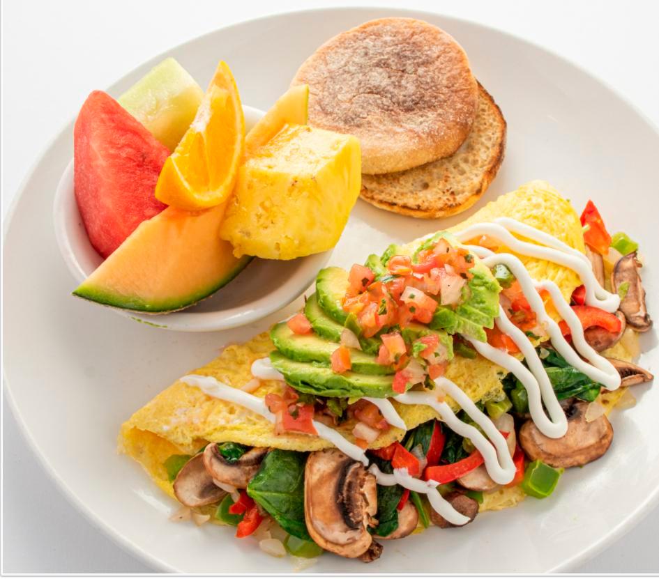 The Mom Omelet · Spinach, mushroom, onion, red and green bell pepper. Topped with avocado, salsa fresca and sour cream.