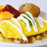 Californian Omelet · Bacon, homefries and American cheese. Topped with avocado and sour cream.