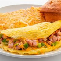 Mile High Omelet · Diced ham, green bell pepper, onion, American cheese. Add avocado for an additional charge.