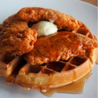 Chicken & Waffles Combo · Crispy chicken tenders served on a Belgian waffle with powdered sugar, pecan drizzle and whi...