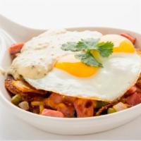 Country Skillet · Homefried potatoes sauteed with diced ham, bell peppers and onions. Topped with sunny side u...