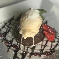Chocolate Lava Cake · Rich Chocolate Lava Cake with a Molten Chocolate center served warm with Vanilla Ice cream a...