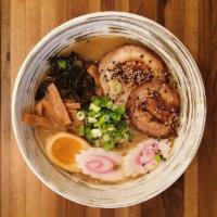 Spicy Miso Ramen · Spicy garlic miso broth, slow-roasted pork belly, marinated bamboo, naruto, soft boiled egg,...