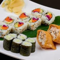C Sushi Combination · Veggie roll 8 pieces, cucumber roll 6 pieces and inari sushi 2 pieces.