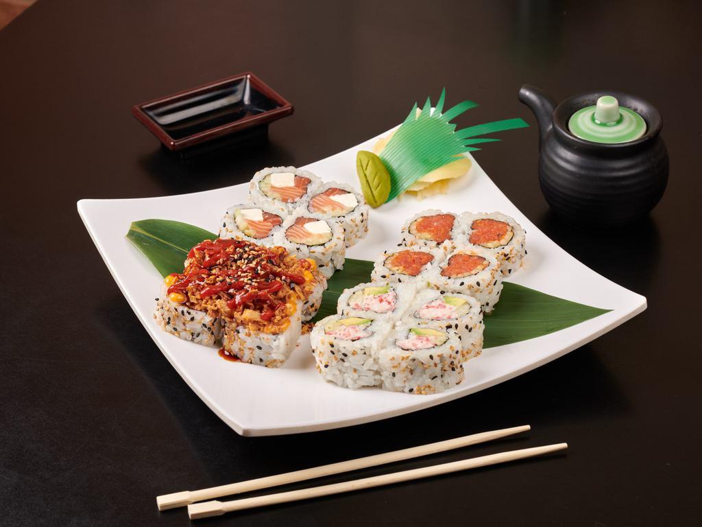 D Sushi Combination · Ca roll 4 pieces, crunch roll 4 pieces, spicy tuna 4 pieces and philly roll 4 pieces.