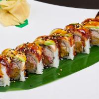 Dragon Roll · Crabmeat, shrimp tempura, cucumber topped with BBQ eel and avocado.