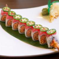 Saguaro Roll · Shrimp tempura, spicy crab meat, cucumber topped with fresh tuna and sliced jalapeno.