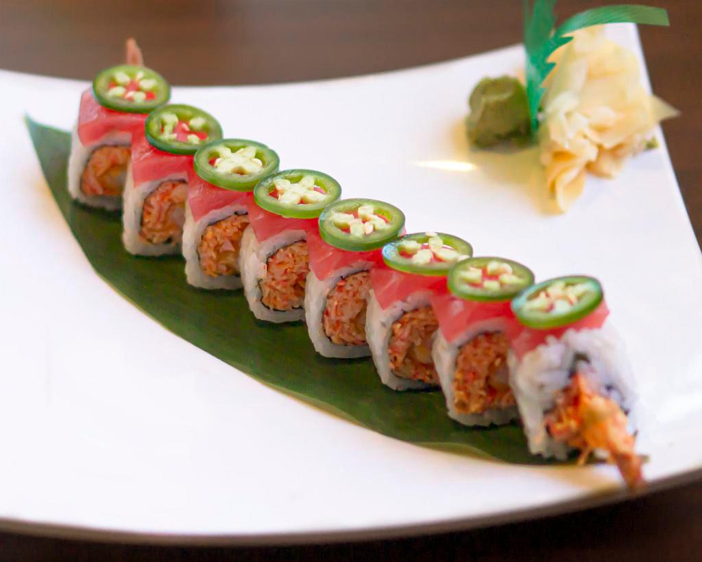 Saguaro Roll · Shrimp tempura, spicy crab meat, cucumber topped with fresh tuna and sliced jalapeno.
