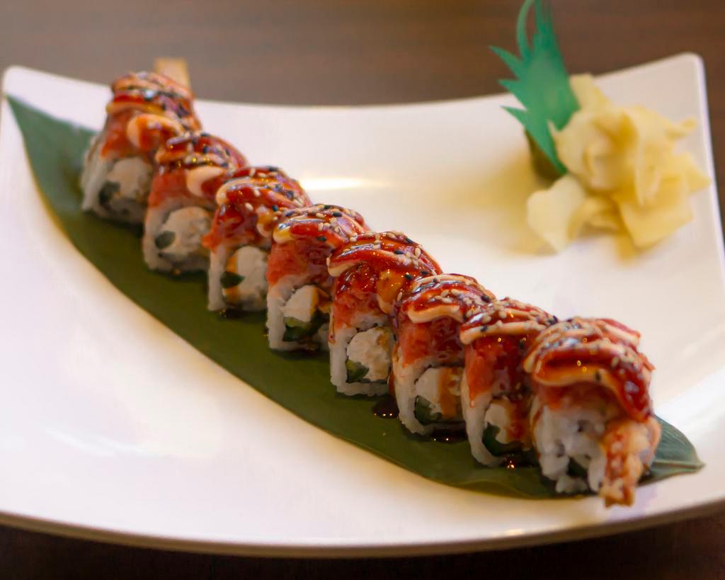 Tiger Roll · Shrimp tempura jalapeno, cream cheese topped with spicy tuna.