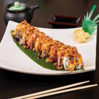 Crunchy Ebi Roll · Crabmeat, shrimp tempura, cucumber topped with crab and crunch onion.