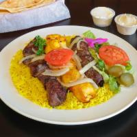 Mixed Al-Sham Entree · Lamb kebab, chicken kebab, and beef kofta, served with garlic sauce.