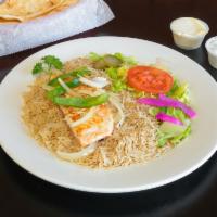 Grilled Salmon · Salmon with onion and green peppers, served with garlic sauce.