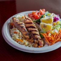7. Grilled Salmon Kebab Plate Meal · Served with 2 sticks, garden salad,basmati raice,chickpeas,raisins.Comes with crispy fries a...