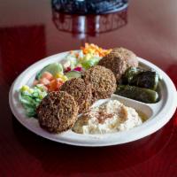 8. Vegetarian Falafel Kebab Plate · Served with 5 falafel balls, garden salad, hummus and dolma.