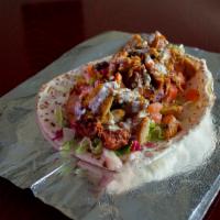 9. Chicken Gyros Wrap · Served in pita bread with lettuce, tomato, cucumber, tzatziki sauce and tahini sauce.