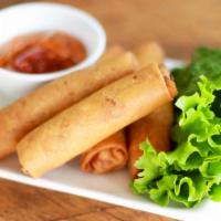 A3. Eggrolls  · 4 rolls. Fried eggrolls with lettuce and mint leaves with fish sauce.