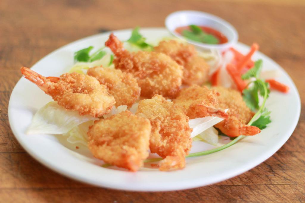 A6. Beer Battered Fried Prawns · 6 pieces of beer battered fried prawn served with sweet and sour sauce. 