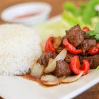 C2. Shaking Beef Plate · Cube steak filet mignon with white rice.