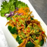 H10. Soft Shell Crab Curry · Lightly fried soft shell crabs in a green curry sauce with bell peppers and basil leaves, se...
