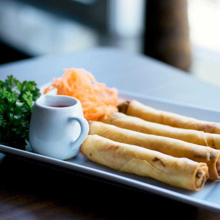 Crispy Spring Rolls Dinner · Cellophane noodles, carrots and cabbage wrapped in spring roll pastry served crispy with tangy sweet chili dipping sauce.