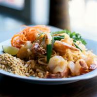 Pad Thai Dinner · Thin rice noodles stir-fried with an egg, bean sprouts in tangy lime tamarind sauce with chi...
