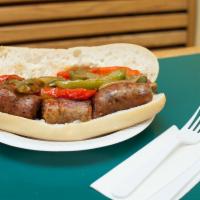 Sausage and Peppers Sandwich · Includes lettuce and tomatoes.