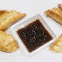 8 Piece Fried Dumplings · Meat dumpling served with special dipping sauce.