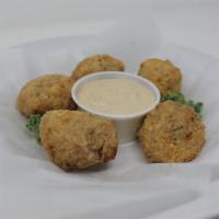 Boudin Balls · 5 boudin balls battered and deep-fried, served with our own special dipping sauce.