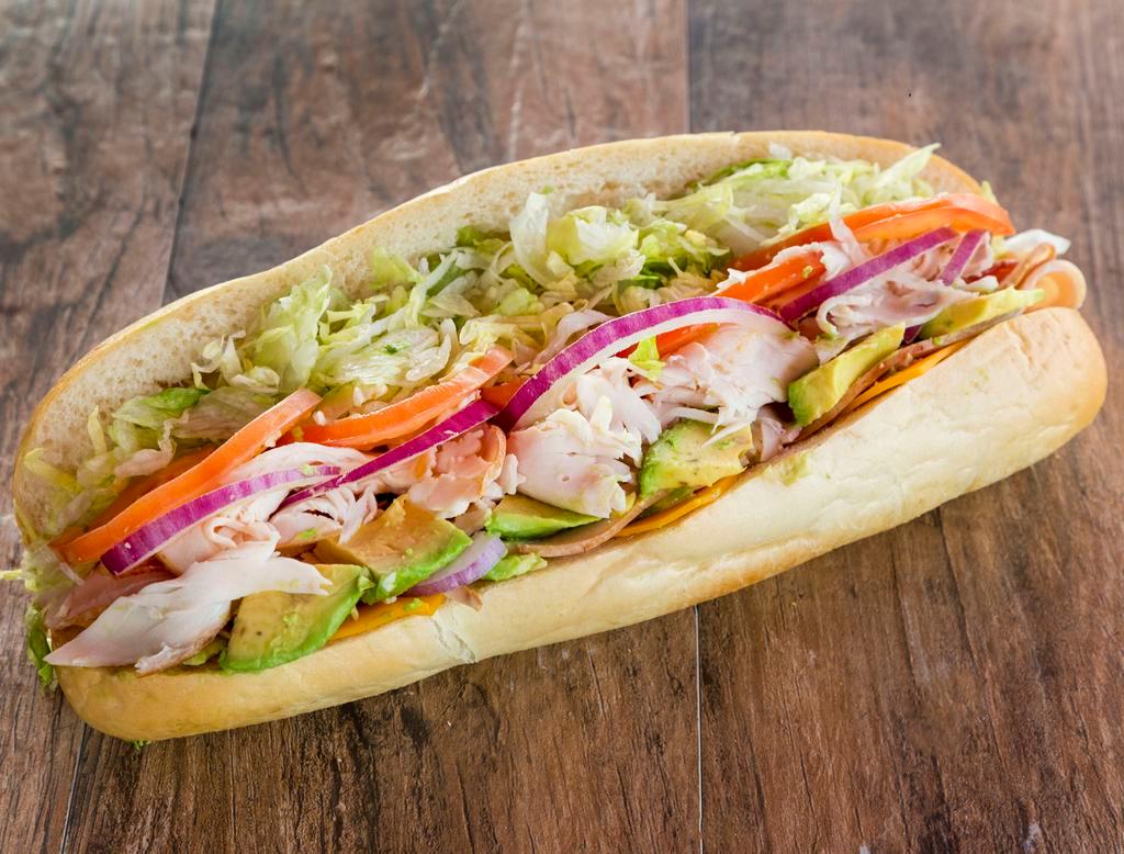 T.B.A turkey bacon and avocado · comes with Italian dressing, mustard, mayo, onion, lettuce and tomato.