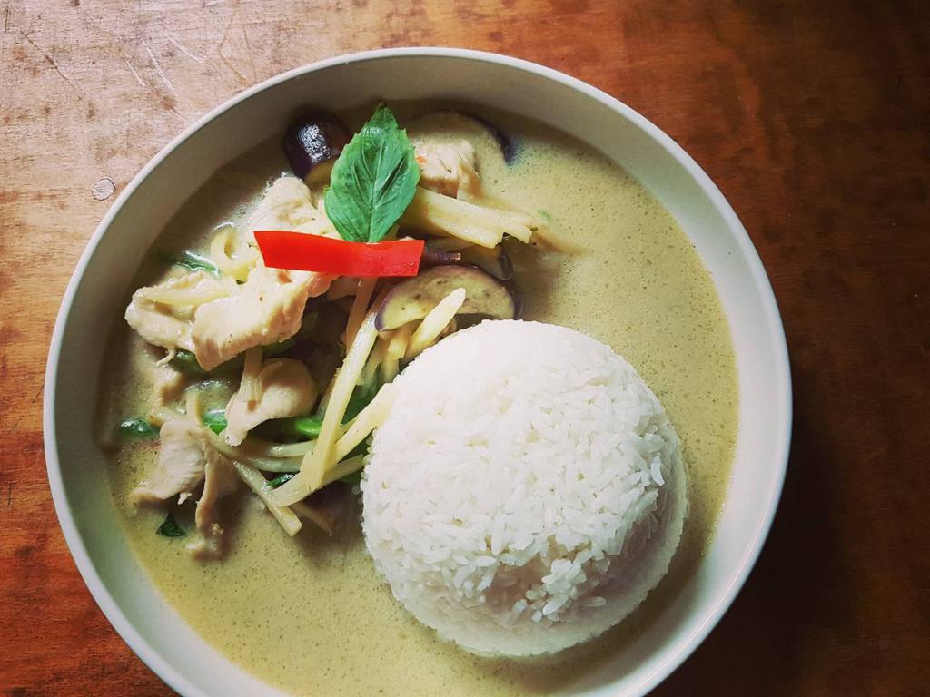 Green Curry · Choice of protein in creamy coconut milk, bamboo shoots, eggplant, basil, bell pepper, and green curry.