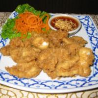 4. Crispy Squid · Deep-fried squid served with sweet and sour sauce.