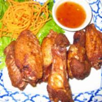 Fried Chicken Wings  · Marinated chicken wings deep-fried and served with sweet chili sauce