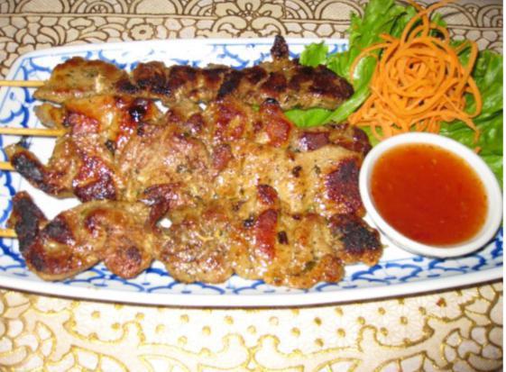 21. Thai BBQ Chicken · Chicken marinated with Thai herbs on a stick, grilled to perfection served
with chili sauce.