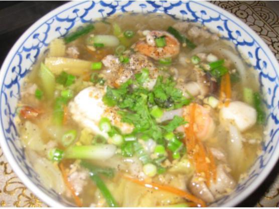 28. Crystal Noodle Soup · Bean thread noodle in a light broth with ground pork, shrimp, seafood ball, nappa, mushroom and carrot.